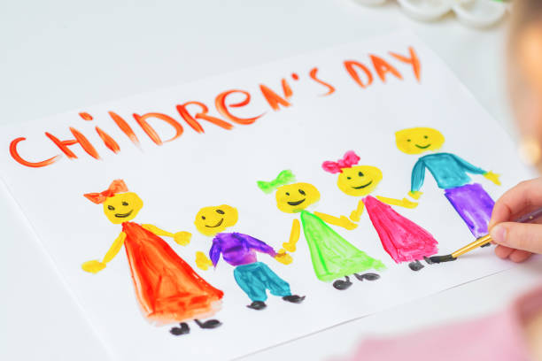 istock Child is drawing Happy Children's Day. 1224860877