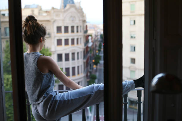 istock young woman practising dance on the balcony 1224861022