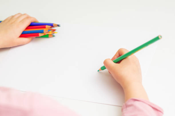 istock Child is drawing by colored pencils. 1224861084