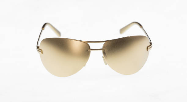 istock golden sunglasses isolated on white background 1224861156