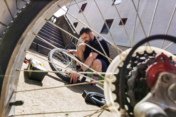 istock Man repairing bicycle DIY 1224863918