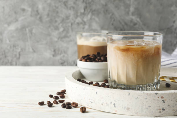 istock Composition with tray with ice coffee on wooden background 1224864039