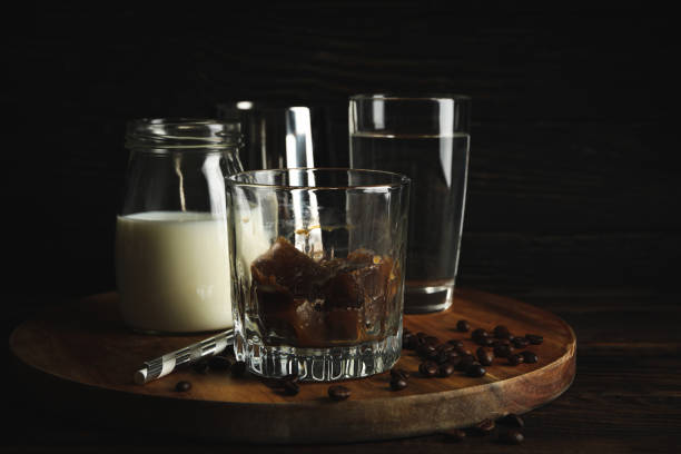 istock Composition of prepare ice coffee on wooden background 1224864255