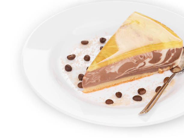 istock A slice of cheesecake and roasted coffee beans. 1224864802
