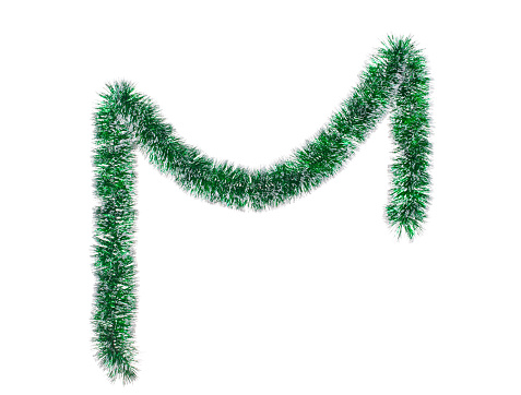 Christmas green tinsel. Isolated in a white background. Close-up.