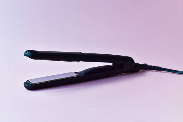 Hair Straighteners Stock Photos, Pictures & Royalty-Free Images - iStock