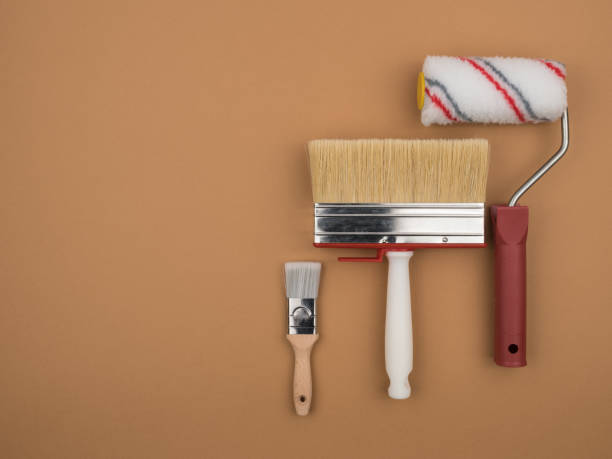 istock Tool for paint finishing work on beige background. Building tool. 1224865939