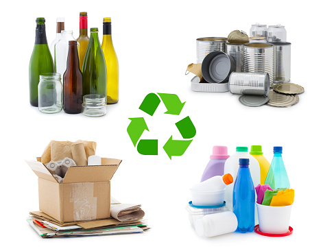 Waste management concept - waste sorting: glass, metal, paper and plastic with recycling symbol isolated on white