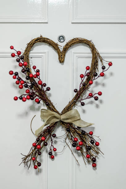 istock Heart from dry branches on door 1224868748