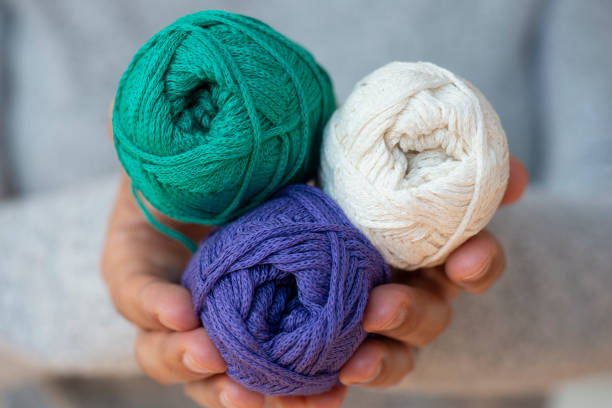 istock Hands Holding A Ball Of Wool 1224870021