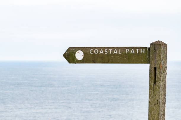 istock Coastal path sign with sea in background 1224871681