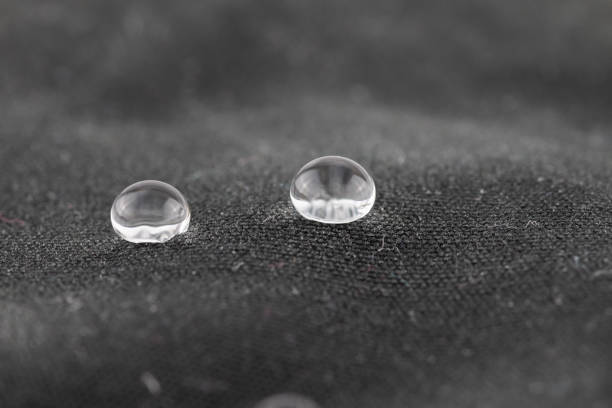 Two Water beads on water repellent fabric