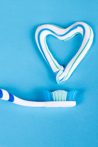 istock Toothbrush and heart made of toothpaste 1224880877
