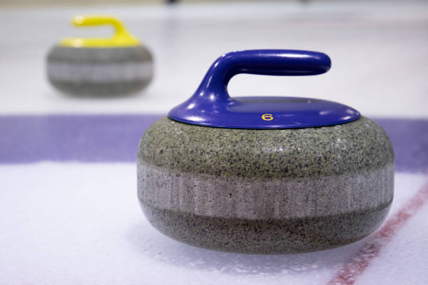 istock Detail of blue curling stone on ice 1224881106