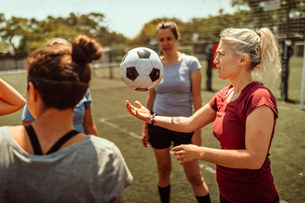 istock Female athletes having discussion before soccer match 1224883803