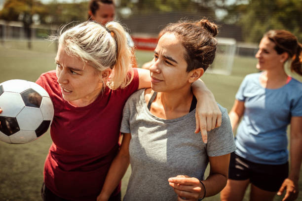 istock Female soccer team on playing field 1224885202