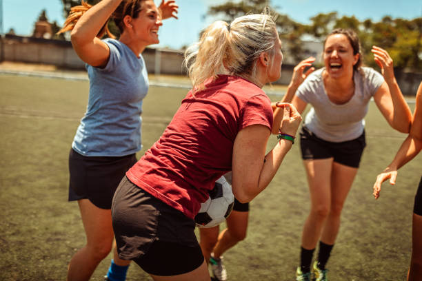 istock Female soccer team celebrating victory 1224885326