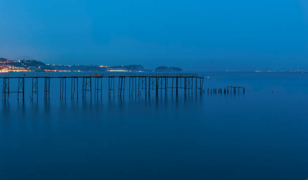 istock Pier of Punta Epitaph at dusk 1224885452