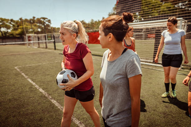 istock Female soccer team on playing field 1224885734