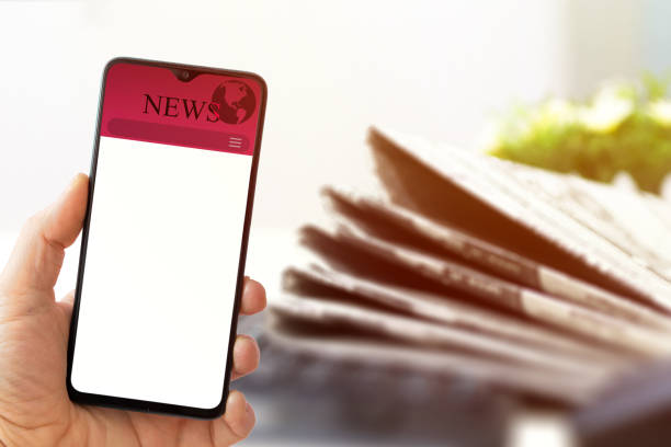 istock person holding smart phone in hand with white blank screen and background 1224885740