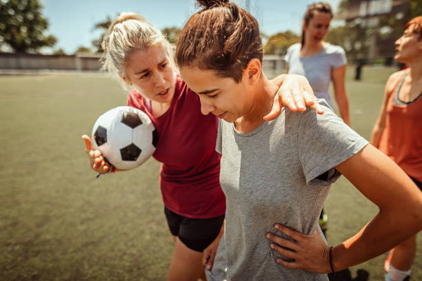 istock Female soccer team on playing field 1224885785