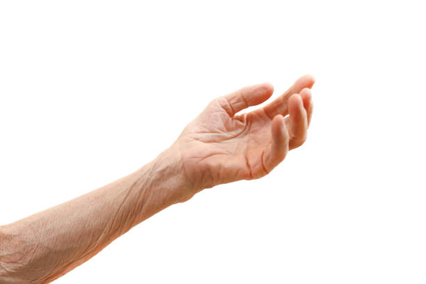 istock Old lady's hand with open palm. Elderly lady is waiting for help. Elderly, Aging concept. Isolated white background, close up, overhead, copy space. 1224885837