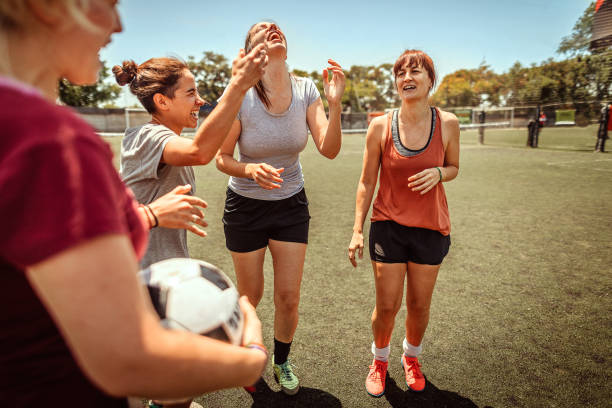 istock Female soccer team celebrating victory 1224885950