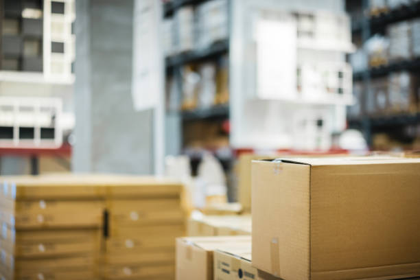 istock Stack of cardboard boxes in smart warehouse industry logistic. 1224887219