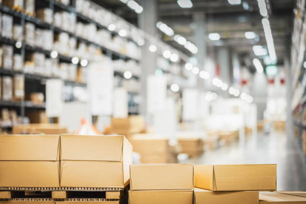 stack of cardboard boxes in smart warehouse industry logistic. - shipping supplies imagens e fotografias de stock