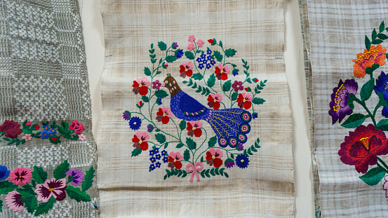 Embroidered good like handmade cross-stitch ethnic Slavic pattern. Towel with ornament. Folk concept.