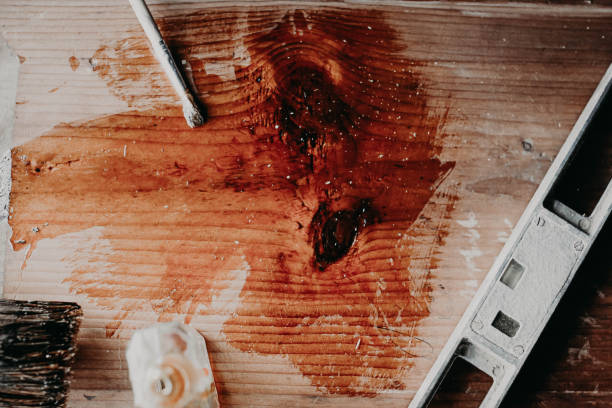 istock Processing solid wood with varnish and epoxy. furniture restoration 1224888560