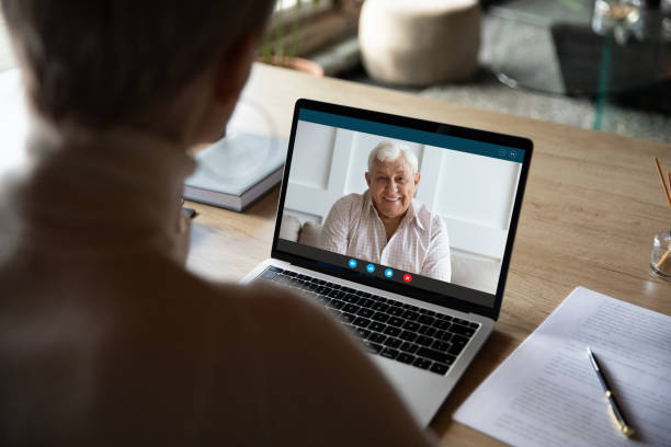 istock Medical insurer provide consultation to old client online by videoconference 1224889799
