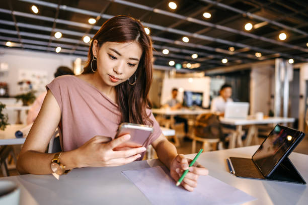 istock Woman working at modern office 1224893625