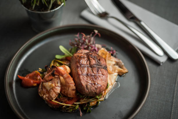 istock Grilled duck breast with grilled tiger prawns 1224893687