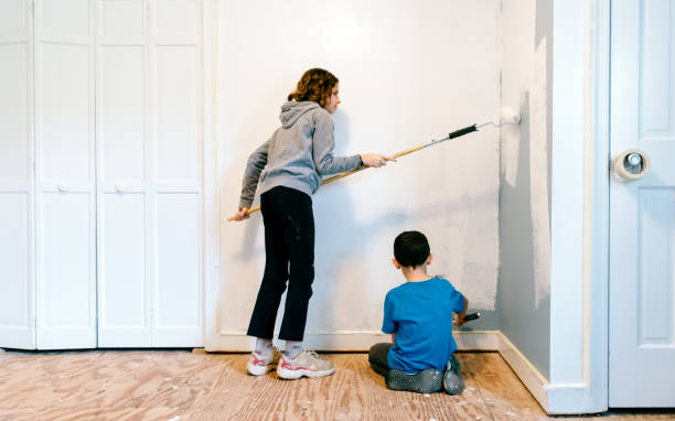 istock Siblings painting bedroom 1224893783