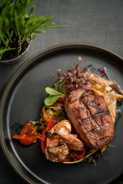 istock Grilled duck breast with grilled tiger prawns 1224894939