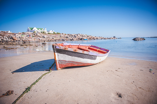 beached boats during low tide in the village of Cancale in brittany in the north of France