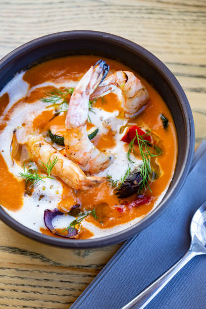 istock Vegetable cream soup with tiger prawns 1224898346