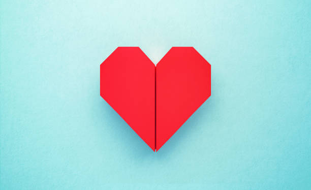Red Origami Heart on Turquoise Background