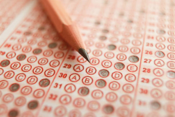 istock Answer sheet with pencil and eraser. close up 1224901379