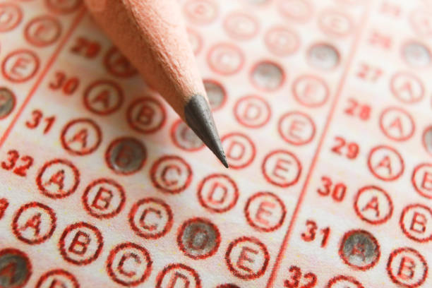 istock Answer sheet with pencil and eraser. close up 1224901382
