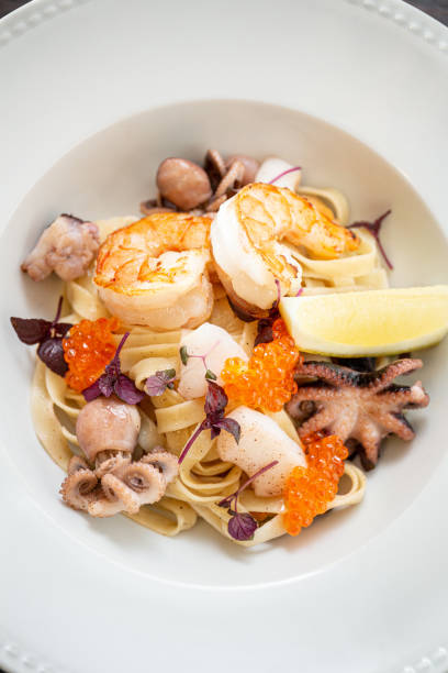 istock Pasta with sea food, caviar, scallops, octopus 1224916194