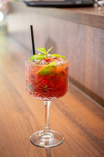 istock Cold and icy red mohito cocktail with orange 1224916241