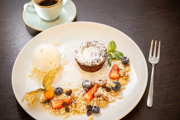 istock Chocolate fondant with vanilla ice cream, almond 1224916365
