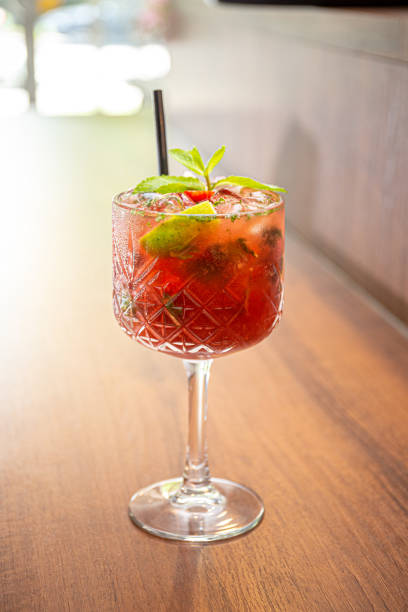 istock Cold and icy red mohito cocktail with orange 1224918807