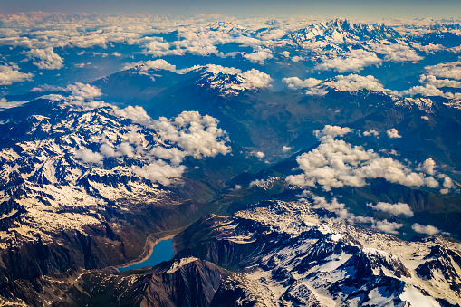 Above snowcapped Mont Blanc Massif and majestic alps – French and Italian alps