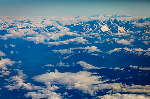 Above snowcapped Mont Blanc Massif and majestic alps – French and Italian alps