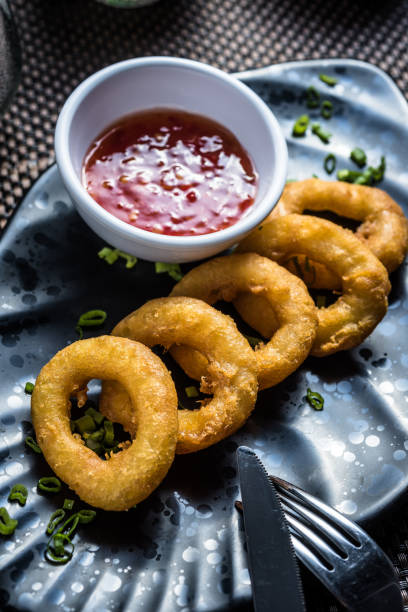 istock Squid rings fried with sweet chili sauce 1224921467