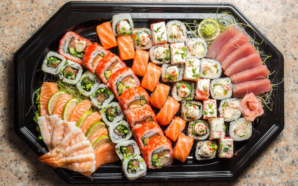 istock Sushi maki roll set with many roll types on plate 1224923396