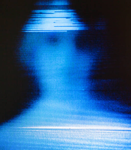 Blurred human silhouette on the screen. Glitch.